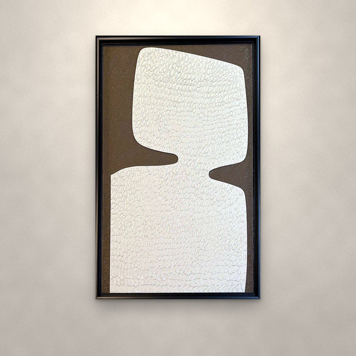 Alabaster ivory monolith relief panel on an ivory wall