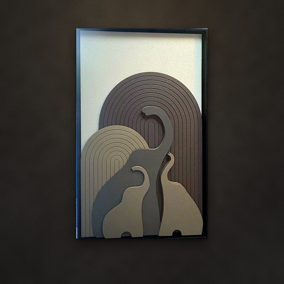 Gaja elephant relief panel on a charcoal wall